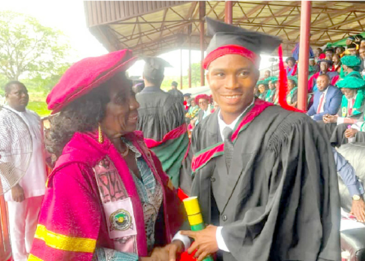 It's Painful My Father Isn't Alive To Celebrate With Me - FUTO First-Class Graduate 1 Peter Ibeh with the Vice Chancellor of FUTO, Professor Nnenna Otti, during the school's convocation.