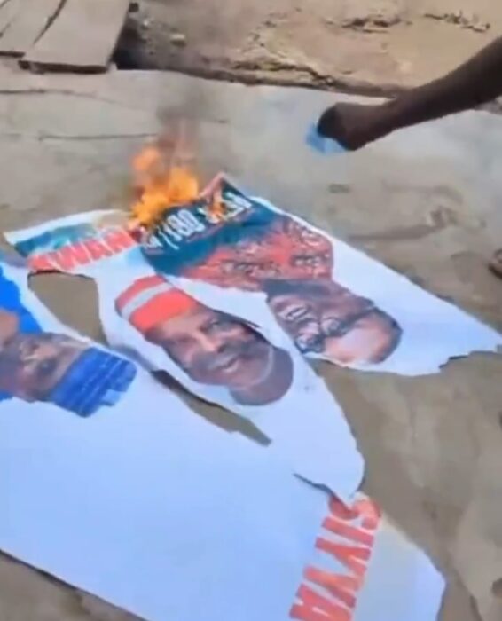2027 Tensions Soar: Mob Torches Obi-Kwankwaso Posters in Kano!