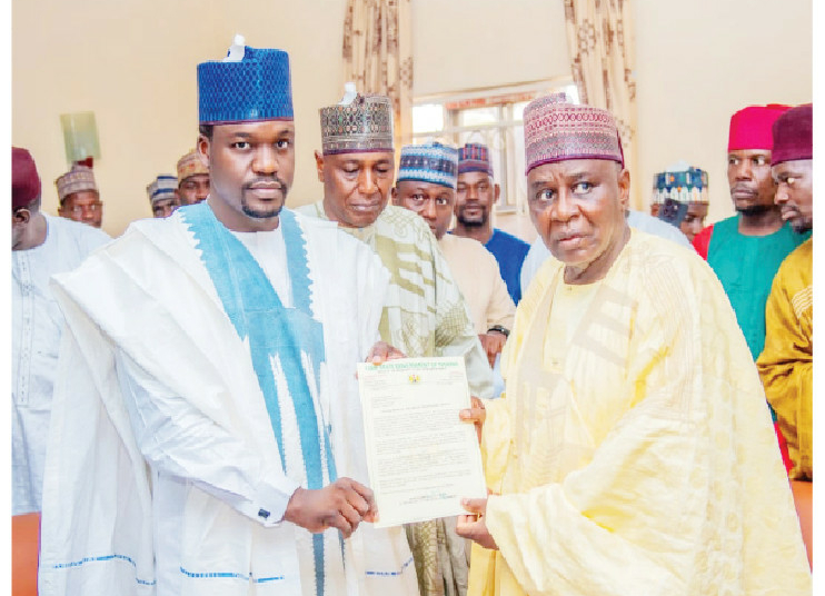 Yobe Acting SSG Presents Appointment Letter To New Emir Of Ngazargamu 1 Yobe Ag. SSG, Dr Mohammed Goje (Left) while handing over the appointment letter to the new Emir o Ngazargamu as approved by Gov Mai Mala Buni