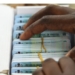 Permanent Voters Cards (PVC) (Photo by Pius Utomi Ekpei/ AFP)