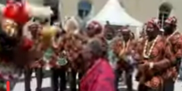 Okonjo-Iweala Showcases Dance Skills  As Igbo Masquerades Perform At WTO Open Day Ceremony