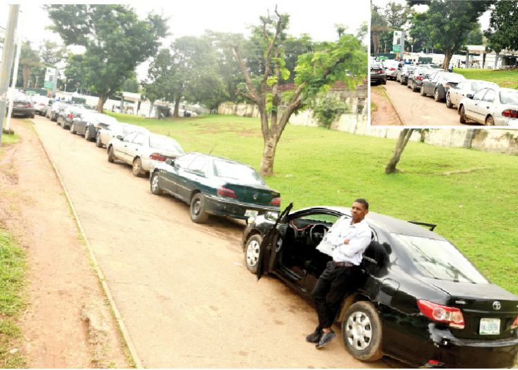 Motorists Lament Persistent Long Queues At CNG Stations 1 Motorists stranded in a queue for CNG at NNPCL filling station, Wuse Zone 1, in Abuja, at the weekend. PHOTO: IBRAHIM MOHAMMED