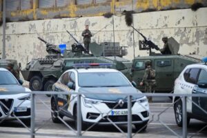 Spain Deploys Troops As 49,000 Migrants Cross Into Ceuta, 19 Dead 3 Spanish soldiers patrol near the Spanish-Moroccan border in Ceuta, Spain, on Friday. Fabian Bimmer/Reuters