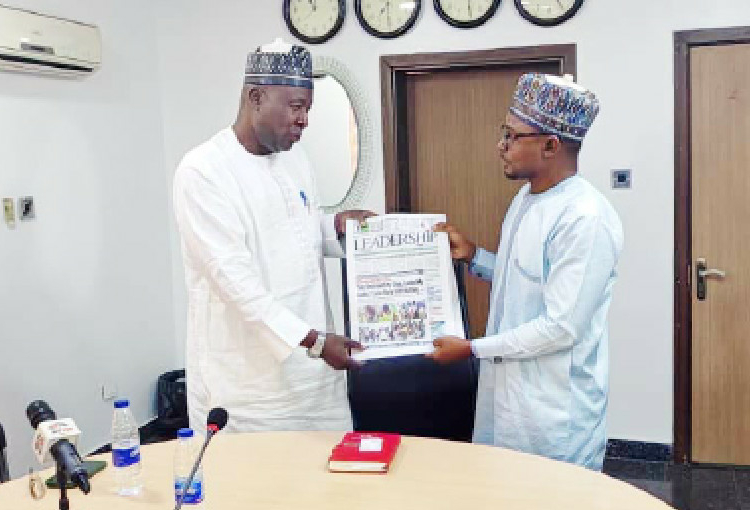 L-R: Kebbi State Commissioner for Information and Culture, Alhaji Yakubu Ahmed, receiving copies of LEADERSHIP newspaper publications from the Group Managing Director, LEADERSHIP Group Limited, Muazu Elazeh, during a courtesy visit by a delegation of the Kebbi State Government media team to the media company’s headquarters in Abuja,yesterday. PHOTO: NGOZI IBE