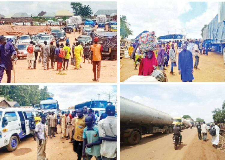 Travellers stranded on the Mokwa-Bida Highway yesterday as drivers protested against persistent banditry and abductions on the road. PHOTOS: NAN AND ABU NMODU