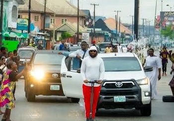 Olu Of Warri Rides Scooter Ahead Of 5th Coronation Anniversary