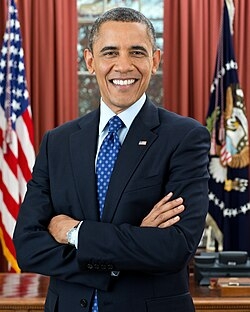 President Barack Obama is photographed during a presidential portrait sitting for an official photo in the Oval Office, Dec. 6, 2012.  (Official White House Photo by Pete Souza)