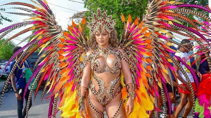 Rihanna Stuns As She Returns To Barbados’ In Show-Stopping Costume 1 Rihanna