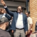 Presidential candidate Brian Muntayalwa Mundubile waves at supporters in Lusaka, Zambia [AFP]