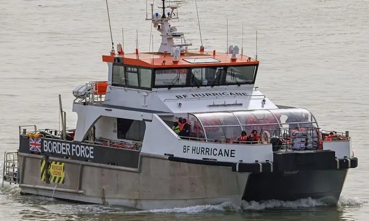 Credit: Anadolu via Getty Images. Border Force Pictured Escorting Migrants To The UK After Being Rescued In The Channel In March