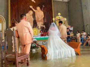 Love Amid Flood: Philippine Couple Marries In Submerged Church 4 Philippine Couple Weds In Flooded Church Despite Hip-Deep Waters Credit: Facebook| St. John the Baptist Parish Hagonoy, Bulacan