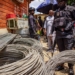 ₦350m Cable Heist: NSCDC Nabs 13 Suspects, Recovers AK-47, Cars