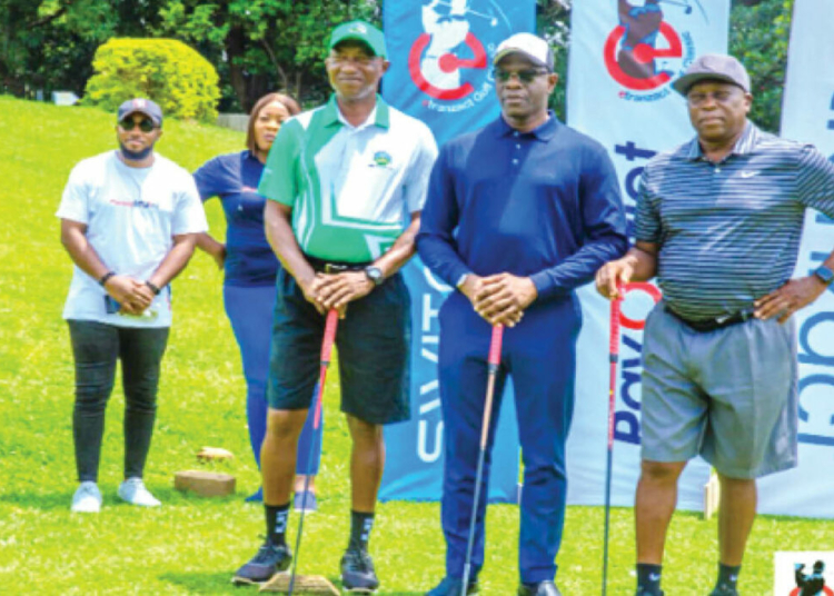 some golfers preparing to hit the course during a recent etranzact golf classic