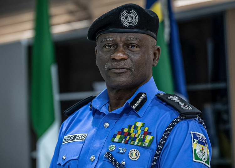 Nigeria's Inspector-General of Police Olatunji Disu poses for a portrait inside his office at the Nigeria Police Force Headquarters, Louis Edet House, in Abuja, on September 9, 2026. Nigeria's police are backing a sweeping overhaul of the country's security structure which would see a shift from the federal force toward state-level management, the force's top officer told AFP. President Bola Tinubu's government is pushing reforms that would require a constitutional amendment to create police forces managed independently by Nigeria's 36 states. (Photo by Light Oriye Tamunotonye / AFP via Getty Images)