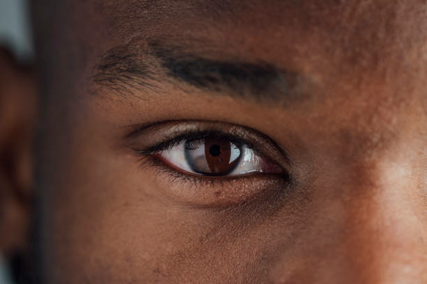 Close up of a mans eye as he looks at the camera at a studio in Newcastle Upon Tyne.